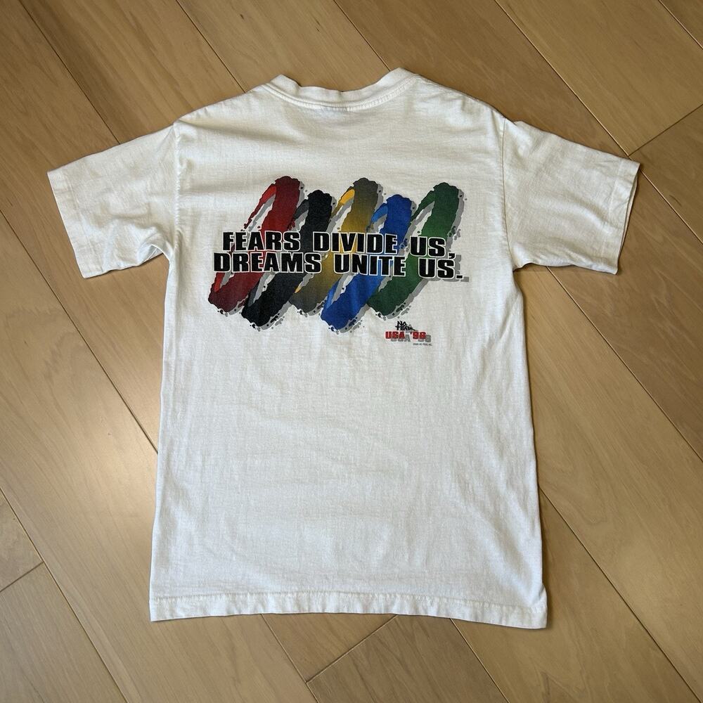 Vintage NO FEAR Dreams Unite Us 1996 White Tee Short Sleeve Size Small/Medium